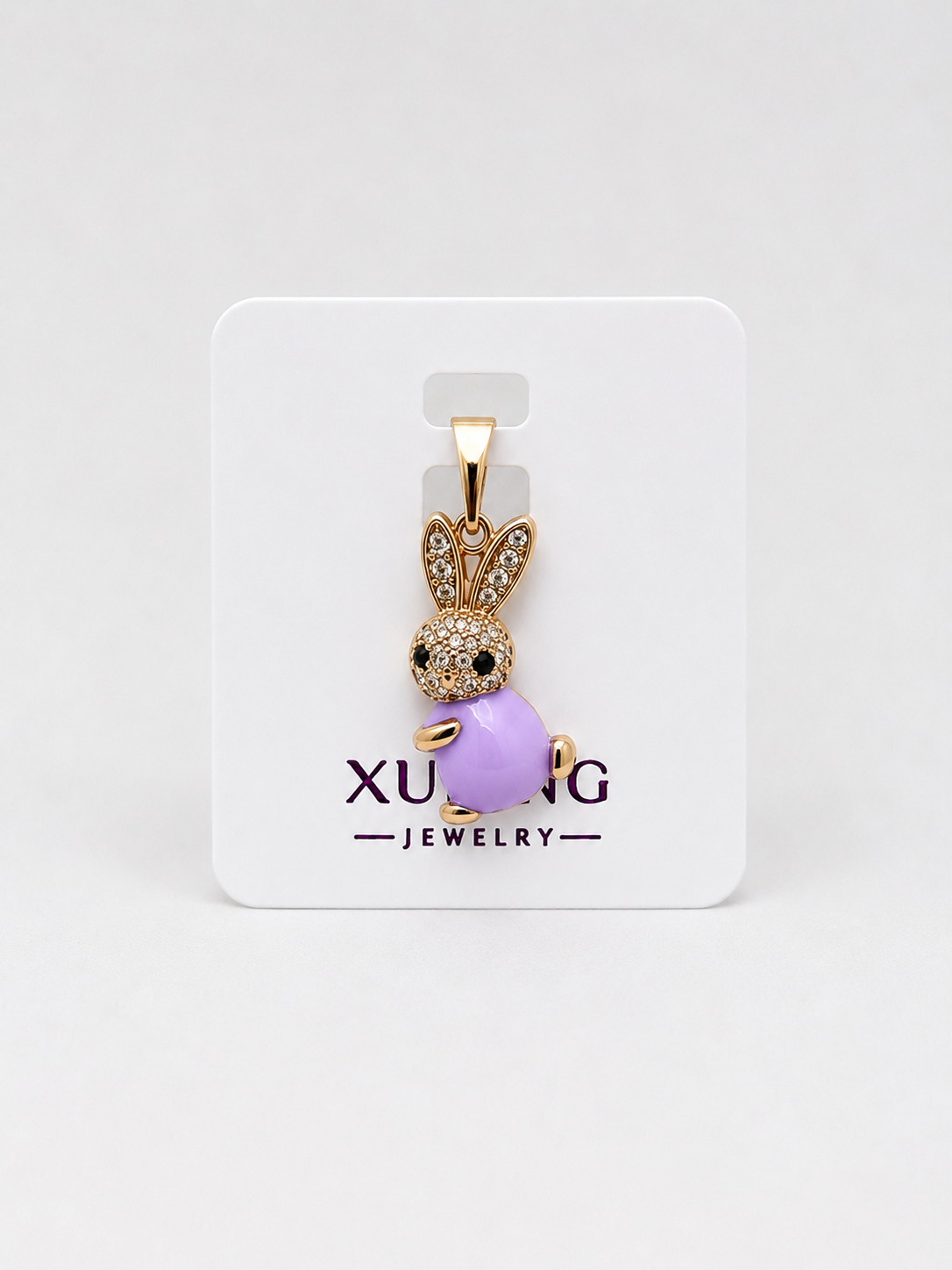 DIJE CONEJITO LILA DOBLE ENCHAPE 18K DORADO