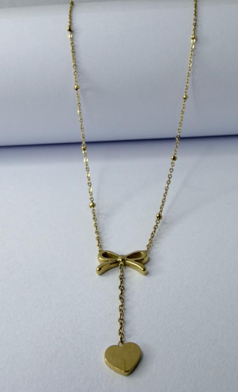 CADENA CON DIJE DE CORAZON Y LAZO DOBLE ENCHAPE 14K (45+5CM)