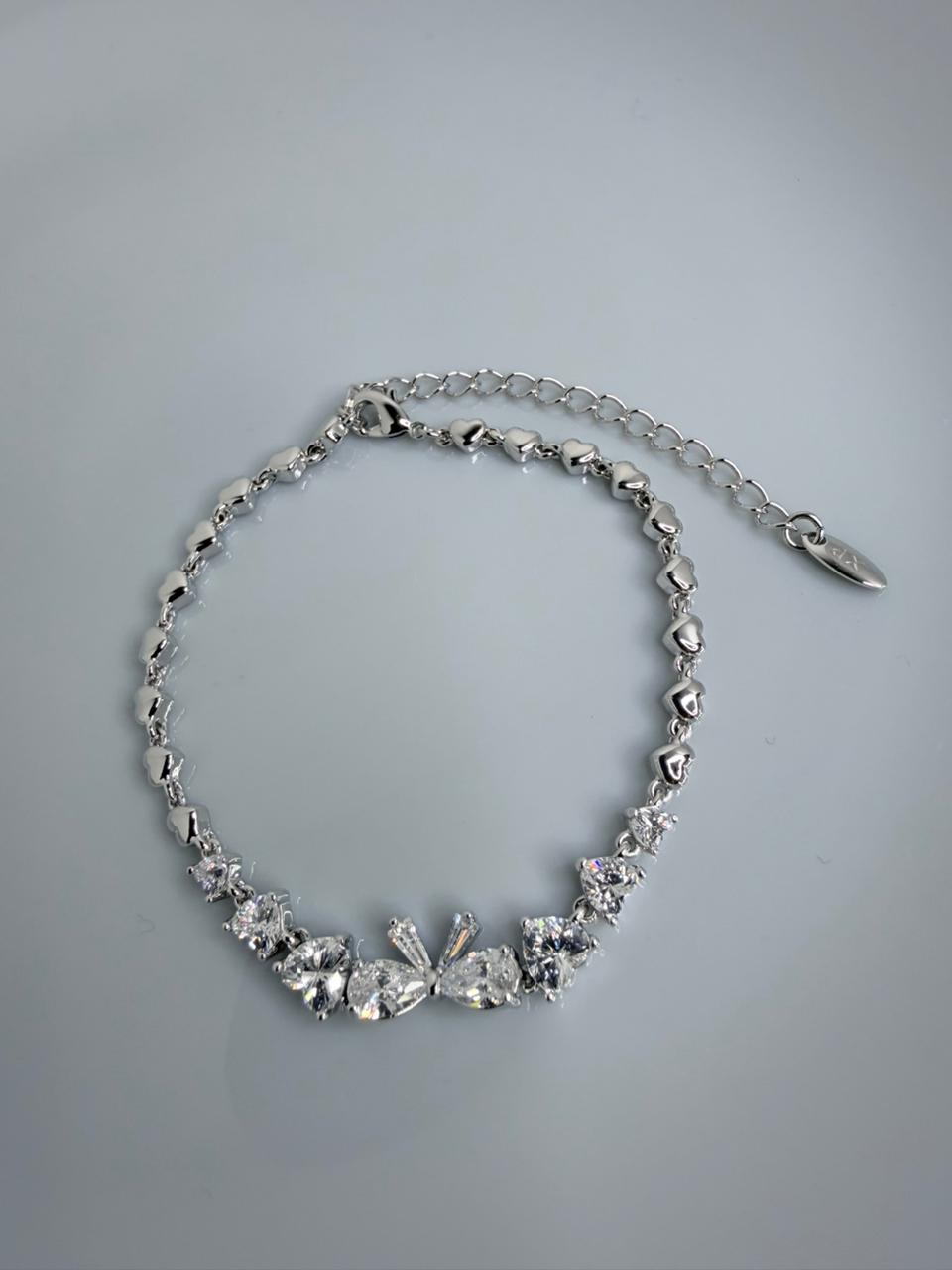PULSERA DE CORAZON CON CIRCONITA BLANCA  COLOR PLATEADO  (16+5CM)