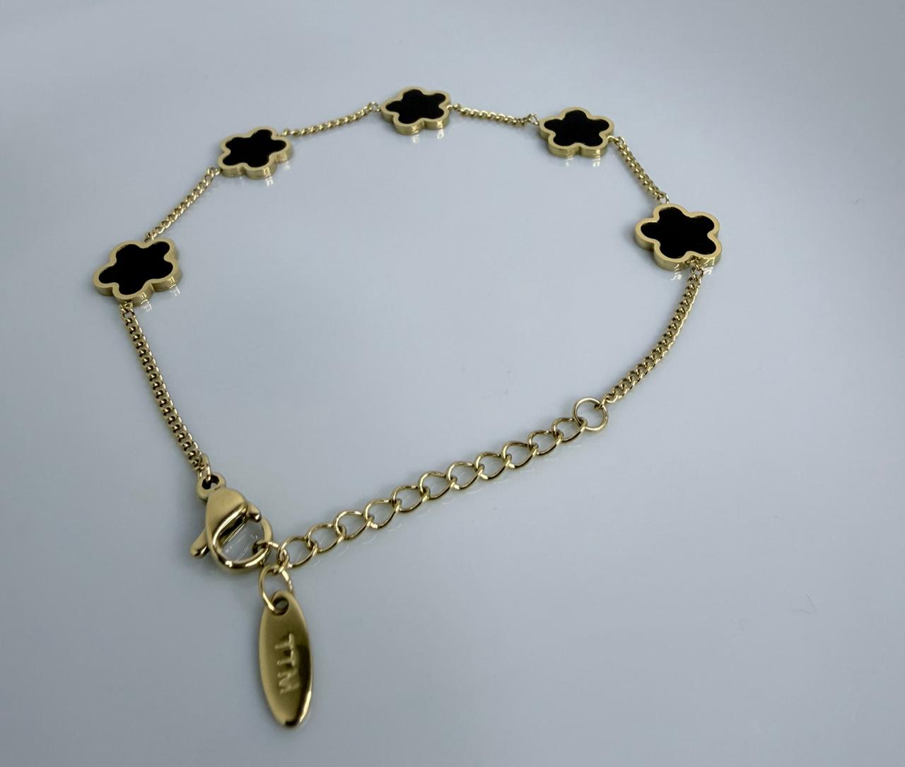 PULSERA CON FLOR COLOR NEGRO DOBLE ENCHAPE 14K (17+3CM)