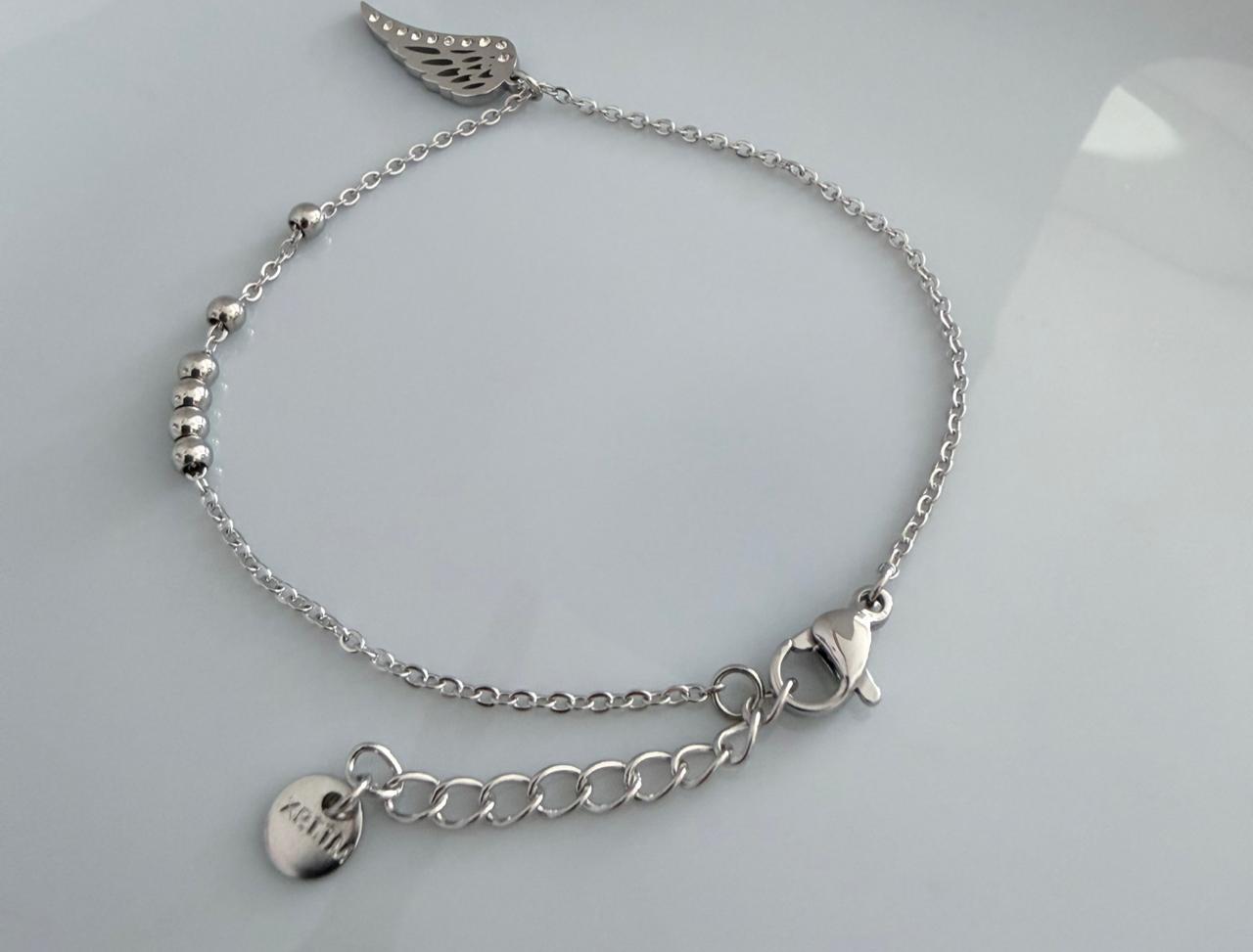 PULSERA DE ALA  COLOR PLATA