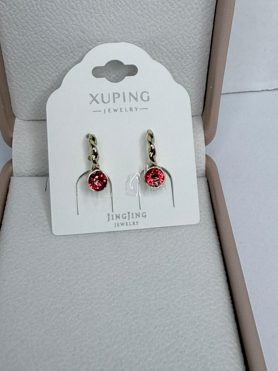 ARGOLLA CON UN CRISTAL ROJO