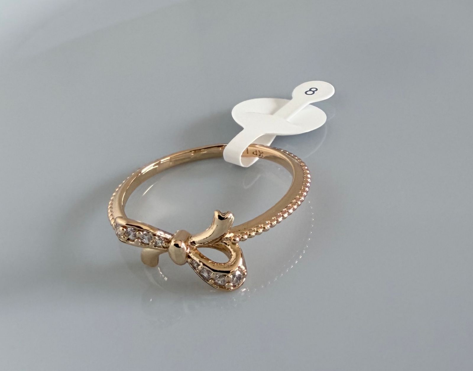 ANILLO CON LAZO INCRUSTADO CON MINI CIRCONITA  DOBLE ENCHAPE 18K 9